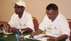 CARICOM Observers Michael Flood and Gocool Boodhoo at a press conference in the wake of Suriname’s general elections. 