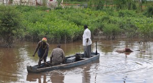 Police ranks bringing the body to land  with the aid of a public spirited citizen