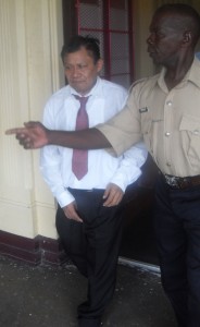 Justin John walks out of the High Court a free man