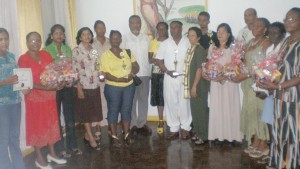 Prime Minister, Sam Hinds, and SBDF’s Managing Director, Manjula Brijmohan, with several  of the entrepreneurs who were honoured at the institution’s Seventh AGM yesterday at Hotel Tower.