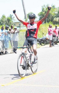 Bigger Better Win! Raynauth Jeffery raises his hands in triumph, winning comfortably. 