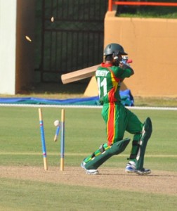 Mehdi Hasan Miraj is loses his stumps as he attempts to pull  a delivery from pacer Ray Joseph (not in picture)