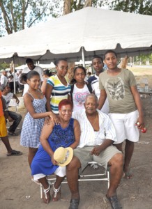 Mr. and Mrs. George Humphrey (seated) posing with their grand children, Troy Humphrey’s children.   