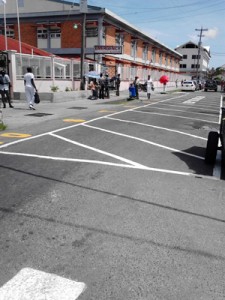 Painted signs on the New Market Street roadway in front of the GPHC Accident and Emergency Ward