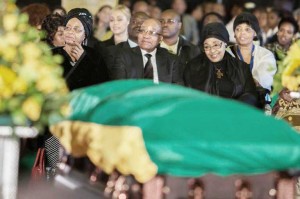 South African President Jacob Zuma (centre), widow of the late Nelson Mandela Graca Machel (left) and Mandela’s ex-wife Winnie Mandela Madikizela (right). (AFP Photo/Irina Kalashnikova)