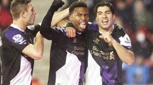 Luis Suarez (right) scored twice as Liverpool recorded their first victory at Stoke (EMPICS)