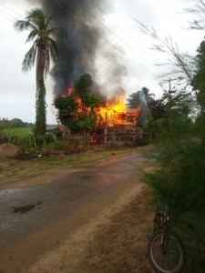 The house engulfed in flames