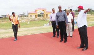 Deputy PS Steve Ninvalle (right) makes a point to Dr Frank Anthony (2nd left) and PS Alfred King (3rd left) during a recent visit at the facility.