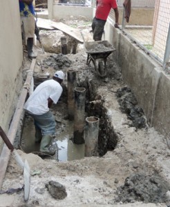 Some of the steel pipes being used around the foundation of the building to further strengthen the entire structure. 