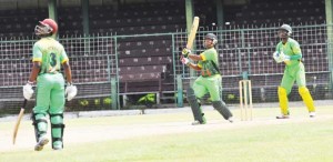 Brian Sattaur, watched by Shemron Hetmyer and Keeper Romaine Morris, hits Ramal Lewis for six.