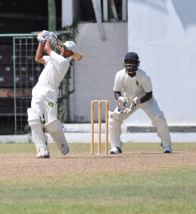 Demerara skipper Vishal Singh plays an attacking stroke enroute to his century.