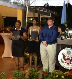 Representatives of the three entities pose with Chargé d’Affaires of the United States Embassy, Bryan Hunt