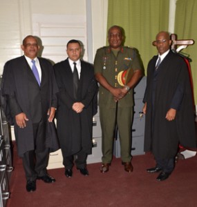 From left, Attorney at Law, Mr. Andrew Pollard,  Attorney at Law, Major Michael Shaoud; Brigadier Mark Phillips, and Justice Brassington Reynolds.