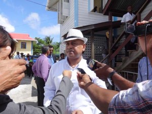 Kaieteur News Publisher, Glenn Lall flanked by reporters shortly after the charge was dismissed at the Sparendaam Magistrates’ Court