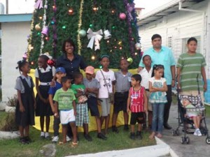 Acting CEO of GPHC, Robby Rambarran and GLC’s General Manager, Tracey Lewis spread Christmas cheer among paediatric patients at the hospital.