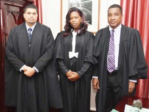 Newly sworn in Attorney Zanna Frank (Centre) flanked by Justice Nareshwar Harnanan and Attorney-at-Law Lyndon Amsterdam.