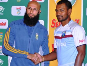 Captains greet each other, Denesh Ramdin (right and Hashim Amla. 