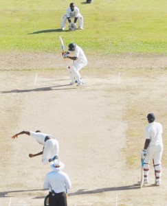 Shane Dowrich avoids a short lifting delivery from a lively Ronsford Beaton during his fighting 50 yesterday. 