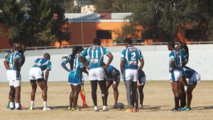 The national rugby team takes a break from a training session in Mexico late last year. 