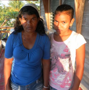 Suzanne Marks with bandaged head and her daughter