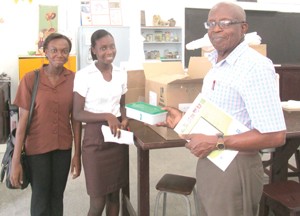 St Stanislaus College representatives receiving a Science kit