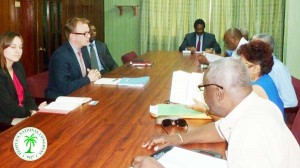 The UN Electoral Mission team during their meeting yesterday with APNU representatives.