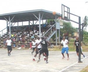 Action in the Hopetown Warriors / Fyrish Black Sharks game on Sunday last at the Fyrish Basketball Court.