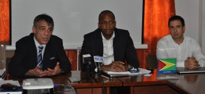 FIFA’s Head of Associations, Premo Cavaro (left) makes a point at yesterday’s brief. At right is CONCACAF Director of Legal Affairs, Marco Leal and head of the GFF NC, Clinton Urling.