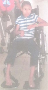  Miss Lisa Marcel in her wheelchair  