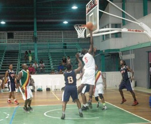 Colts’ Forward, Haslyn Hooper (#5) powers his way through the paint for a lay-up off the glass against Falcons Wednesday night.