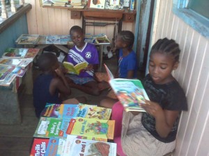 A group of young readers at the library 