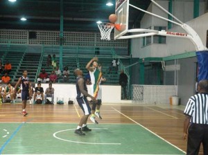 Colts’ Guard, Shelroy Thomas (right) works his magic Wednesday night at the Cliff Anderson Sports Hall when the NBC continued.