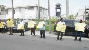 AFC protesters outside the GGMC Head Office yesterday.