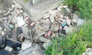 Garbage, mostly Styrofoam products, clog the drains of Georgetown.