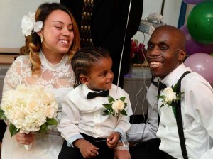 Christopher, his wife and son on his big day