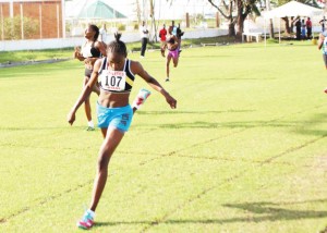 Kenisha Phillips comfortably wins the Girls 200m U-18 race yesterday at the GDF Base Camp Ayangana Ground.