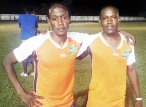 Conqueror’s winning duo Odell Williams (left) and Jermine Junor bask in the moment after the final whistle