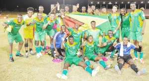 The Golden Jaguars in a jubilant mood following their triumph against St. Lucia last evening.