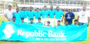 The winning Lower Corentyne team poses with their trophies and members of the Berbice Cricket Board. 