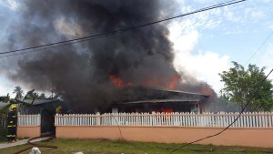 The fire quickly engulfed the family’s property.