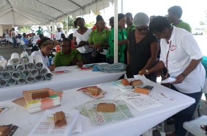 Health officials attending to some patrons at the outreach yesterday.