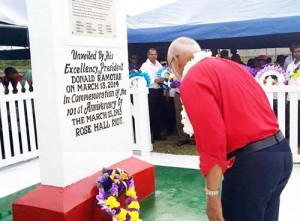 President Ramotar laying a wreath at the Monument.