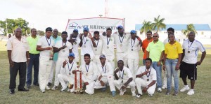 Members of the victorious GCC team with representative of the sponsor. 