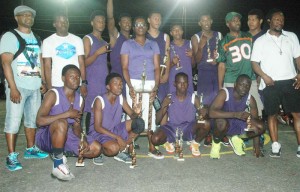 The Victory Valley Royals Schools’ Basketball Champions, Linden Technical Institute with fans and supporters pose for a photo opportunity after wresting the 2015 title from Mackenzie High School Wednesday night.