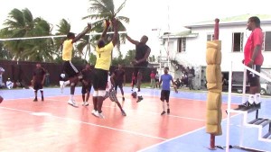 MVP Adityanand Singh (right) uses the block set up by Levi Nedd & Klondyke Rodney in the final match.