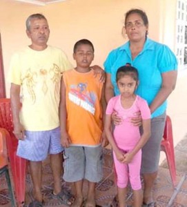 The relatives of Nandanie Mohan including her mother and two children, Omardat and Sabrina.