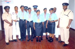 Police Martial arts: Superintendent Paul Williams (left), Kurliegh Simon (right) with the recruits and Trainers. 