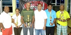 From left; President Mohamad, Christine Sukhram, ‘Pur’ Persaud, Mr Avalon Jagnandan, Kalyan Tiwari and former President Hilbert Shields for Patrick Prashad at the presentation.