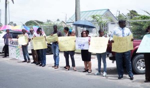 Protestors outside the Ministry of Health, midday yesterday.