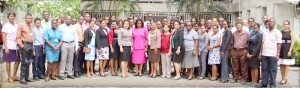 Harper (centre, front row) poses with her colleagues at the Ministry.